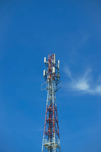 istock communication tower or 4G 5G network telephone cell site  on blue sky and space for text. 1761207020