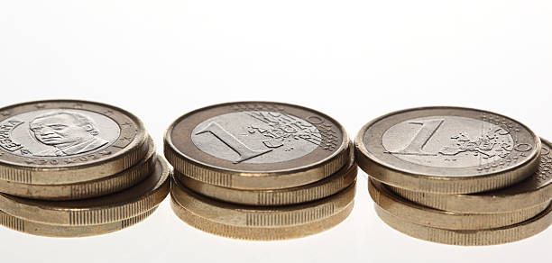 Row of stacked Euro coins stock photo