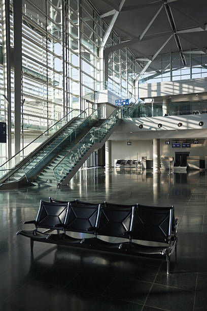 istock Sunny Empty Airport Check-in Hall with Waiting Chairs 176121007