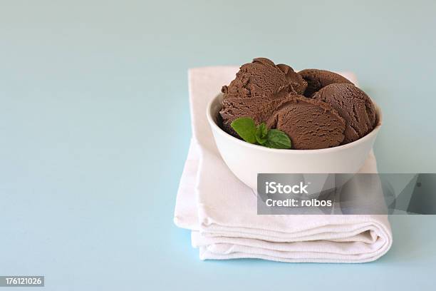 Chocolate Ice Cream In White Bowl Stock Photo - Download Image Now - Bowl, Chocolate Ice Cream, Blue