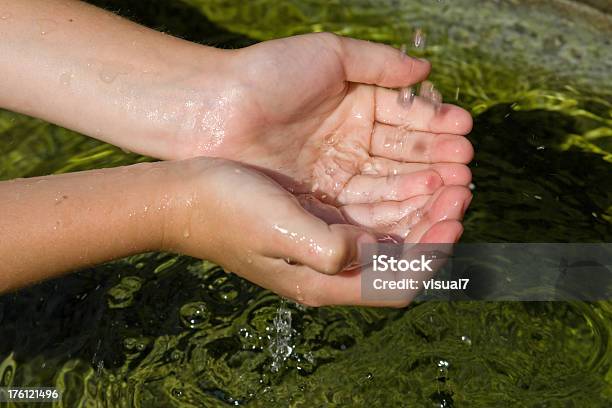 Hands Catching Falling Water Stock Photo - Download Image Now - Catching, Child, Clean