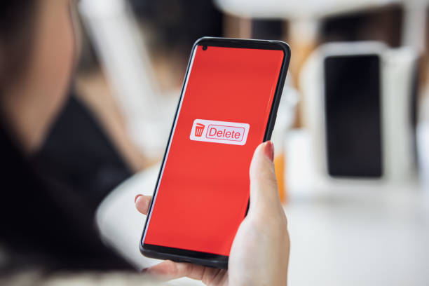 istock Deleting documents, junk mail, electronic messages, or personal information in Smartphones. 1761216327