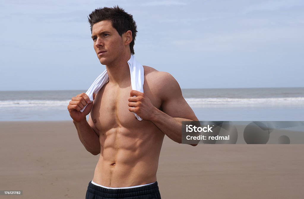 torso en la playa - Foto de stock de 20-24 años libre de derechos