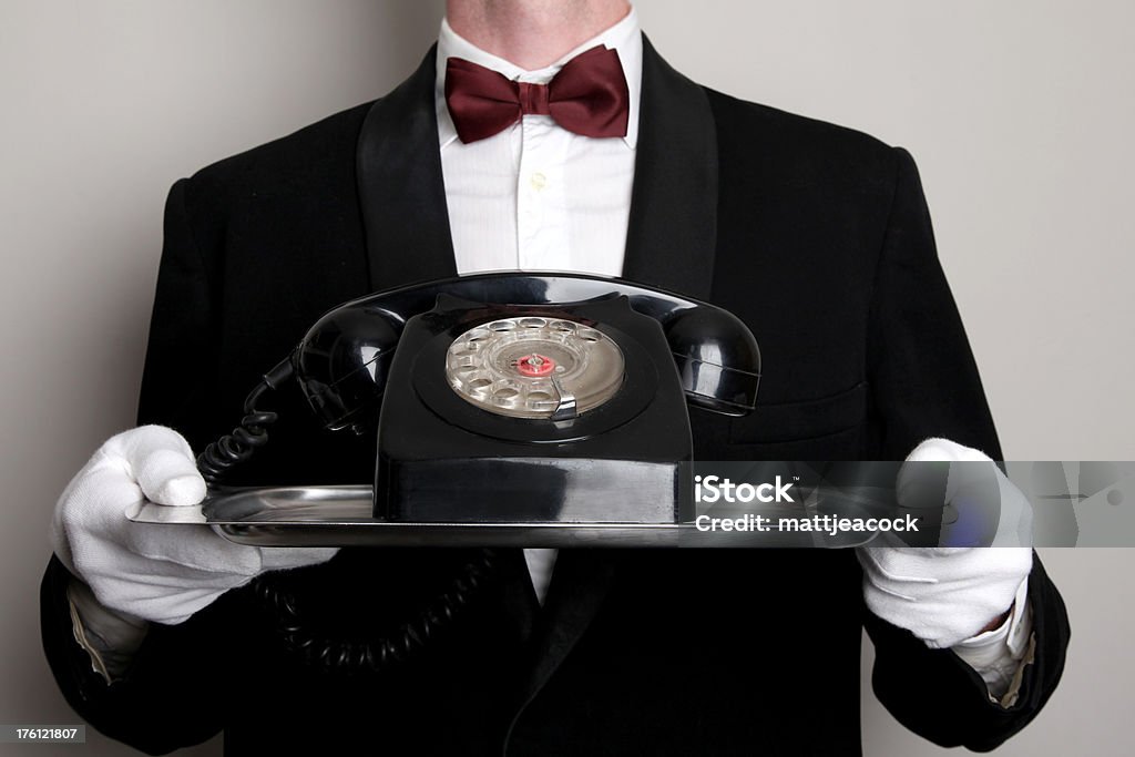 Important call Butler Stock Photo