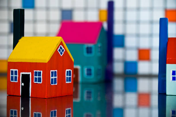istock Home figurine house yellow red 176121906