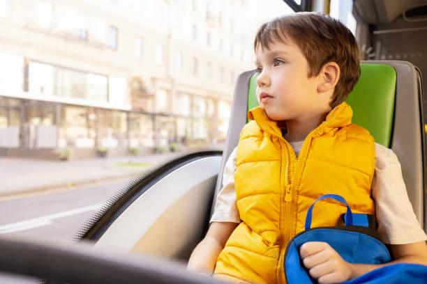 istock 6 year old boy goes to school by bus 1761226574