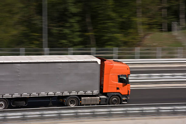 istock Truck on a highway road. 176122750