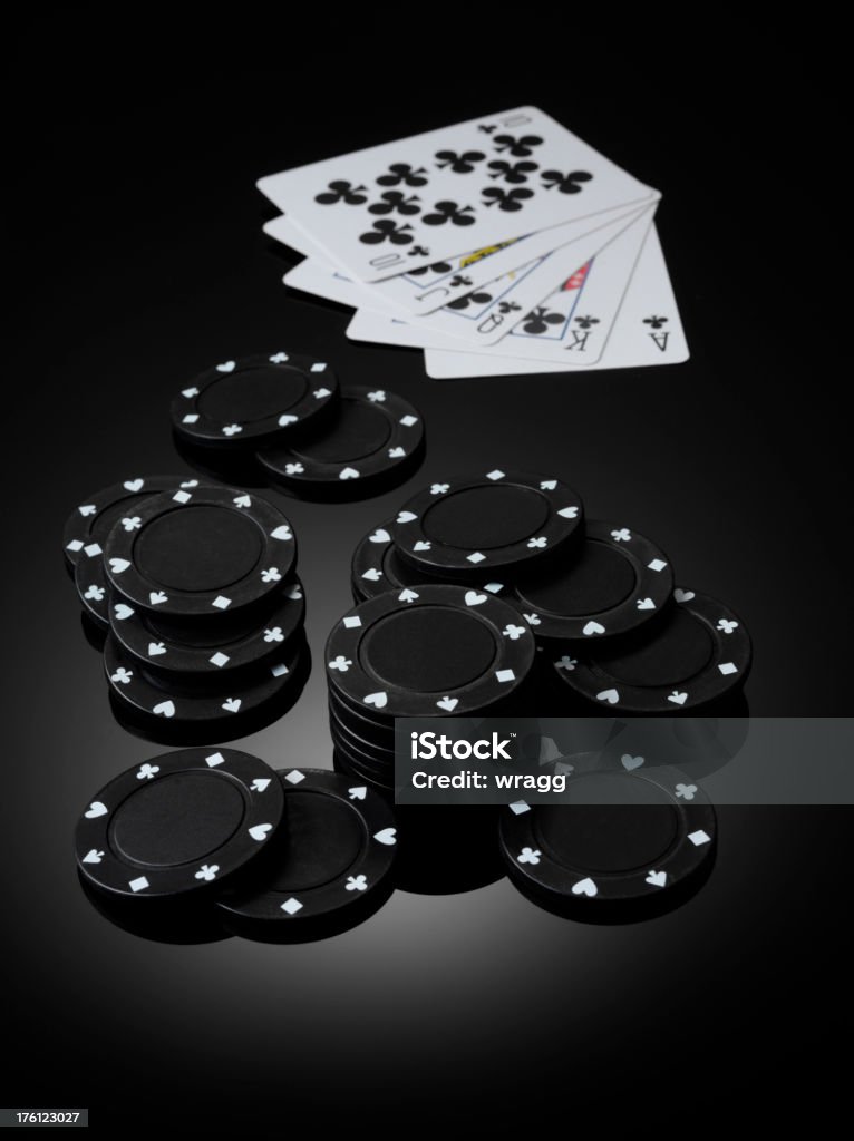 Cards and Poker Chips "Winning hand, in a game of cards with poker chips.To see more of my card and gambling images, click the link below." Ace Stock Photo