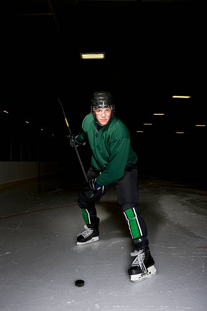 istock Hockey Player Slapshot 176124139