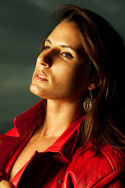 istock Young Woman In Red Leather Jacket 176124234