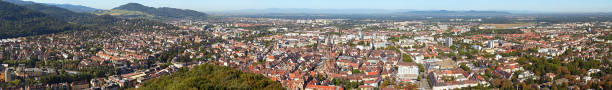 Panorama of Freiburg im Breisgau, Black Forest, Germany. View from the Schloßbergturm. In the background you can see the Vosges in France and the Kaiserstuhl.