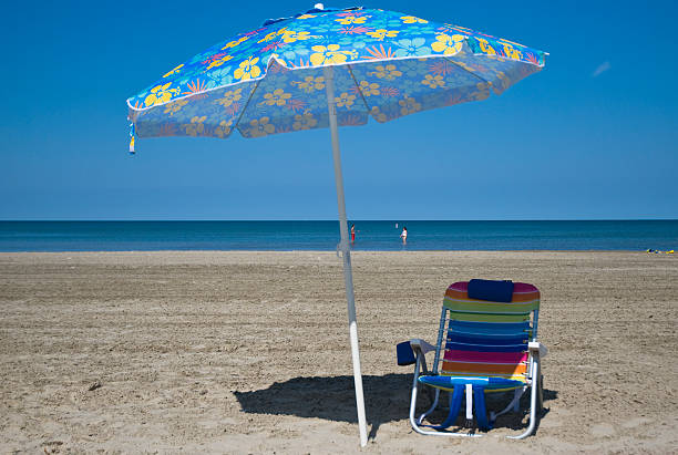 istock Sunchair and umbrella. 176125030