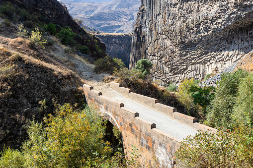 symphony of the stones - Garni bridge over Goght river in Garni gorge in Armenia on sunny autumn day