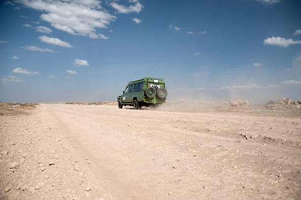 istock Safari truck at a dirt road 176125570
