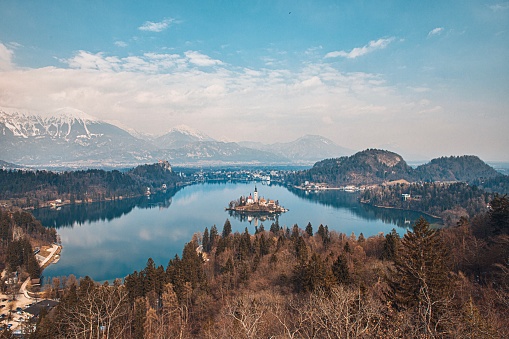 Lake Bled with the Bled island, in Gorenjska (Upper Carniolan region), Slovenia, during a beautiful springtime day. High angle drone point of view.