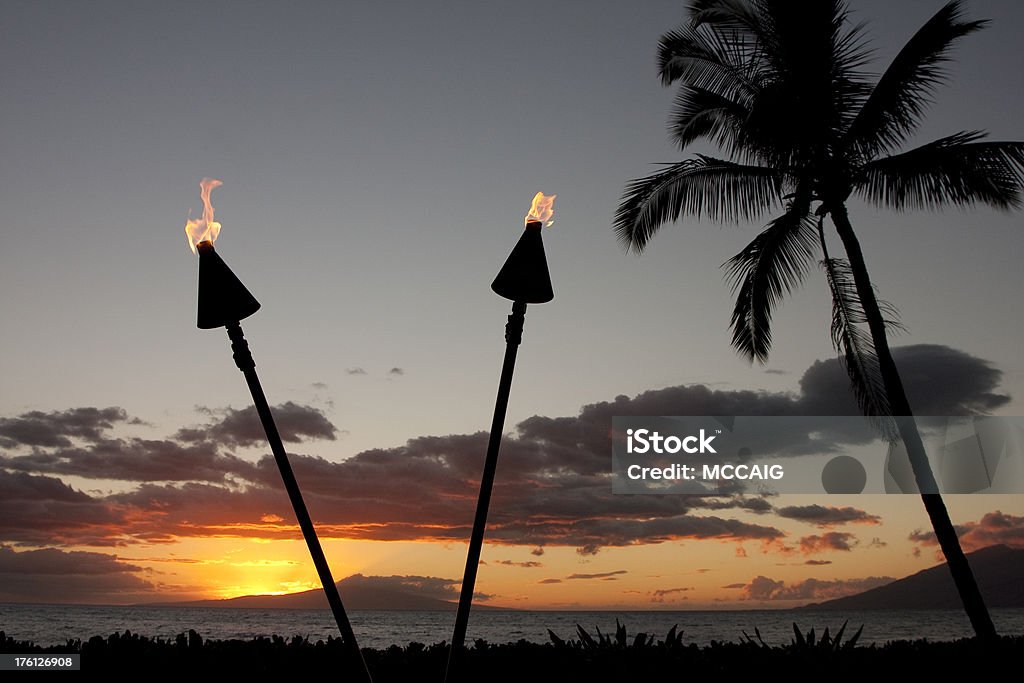 Isla de sunset - Foto de stock de Antorcha libre de derechos