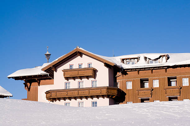 istock Single hotel in winter landscape 176126935