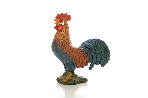 Toy rooster isolated on a white background