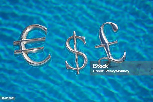 Dollar Euro Pound Signs Floating In Water Stock Photo - Download Image Now - British Currency, Copy Space, Currency