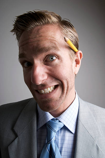 istock Keen Office Worker w Pencil Behind Ear 176127592