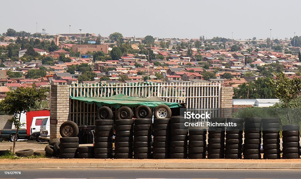 Cityscape of Soweto in South Africa "Skyline of Soweto behind a pile of tires, Johannesburg,South Africa." Africa Stock Photo