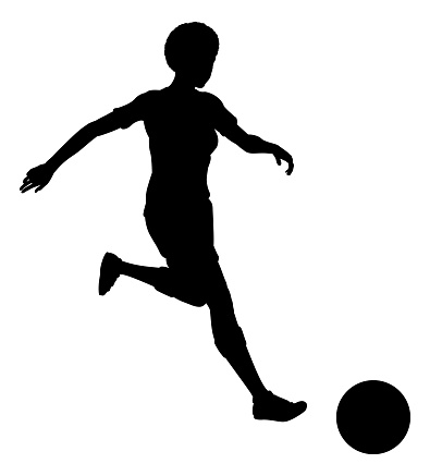 A black woman footballer soccer football player in silhouette