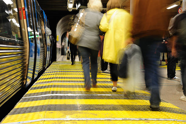 istock Stressed people leaving the subway 176128856