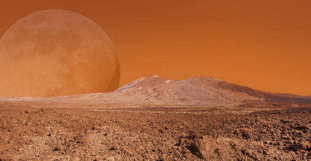 istock Red planet landscape like Mars with big moon satellite. Exploration and science fiction background. Elements of this image furnished by NASA. 1761289773