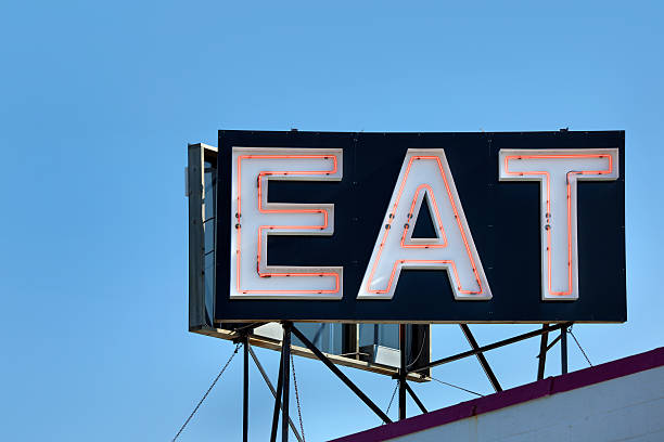 istock Americana Diner; Generic Neon Eat Sign on Restaurant Roof 176131032