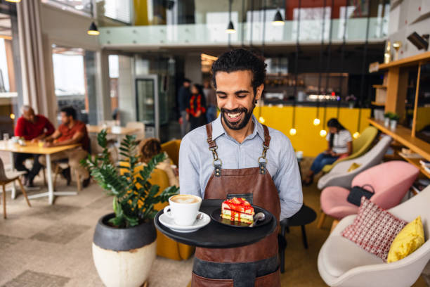 istock A Cheerful Adult Male Middle Eastern Bartender Working In A Charming Cafe 1761310435