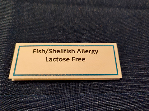 fish shellfish allergy lactose free sign on the table at glasgow scotland england UK