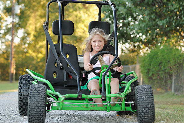 istock Young Girl on Green GoCart 176131281