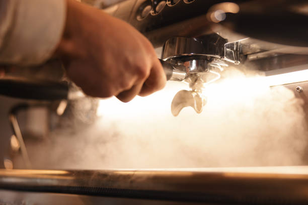 Close Up Of Coffee Preparation On An Espresso Machine