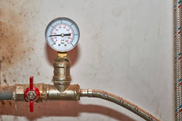 istock Pressure sensor, meter and faucet on the water pipe in the basement 1761317259