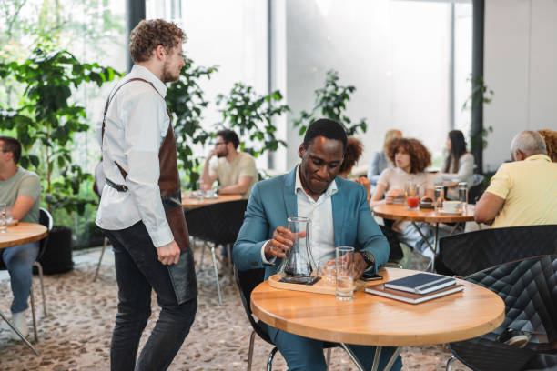 istock A Modern Cafeteria Full Of People 1761318936