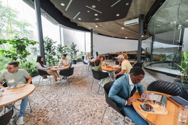 istock A Modern Cafeteria Full Of Customers 1761318942