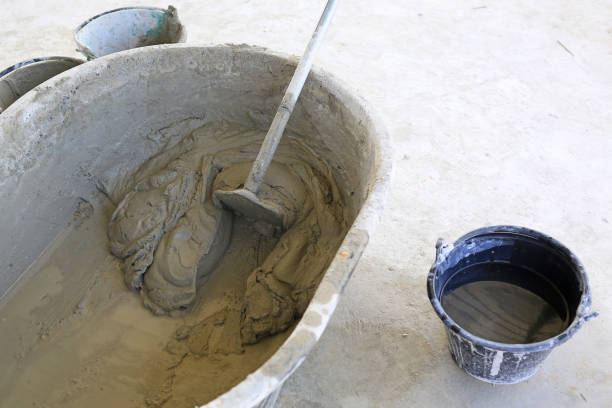 istock Heap of hand mixed concrete with spade. 1761319528