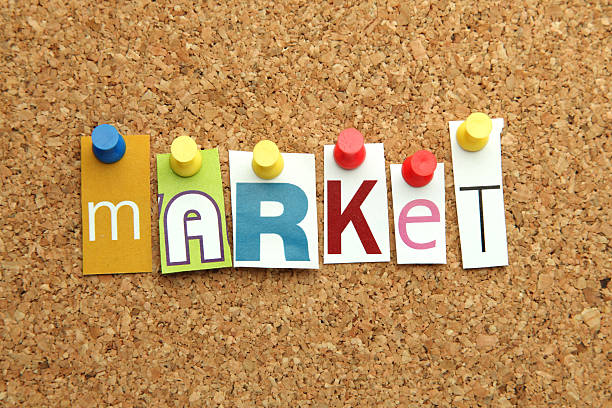 istock The word market pinned on a cork Pin board 176132578