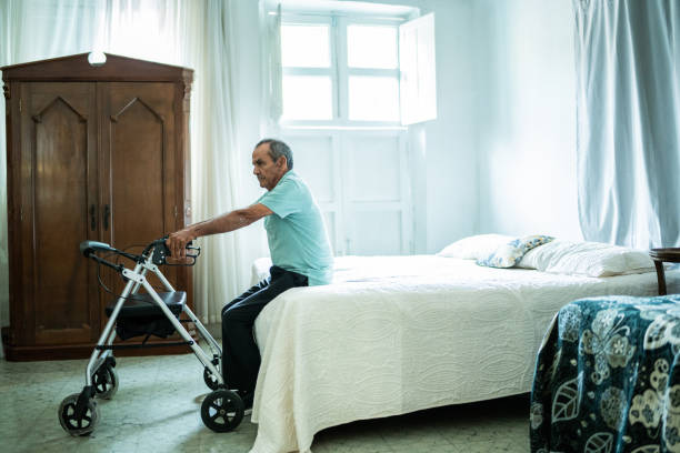 istock Senior man with a mobility walker at home 1761326740