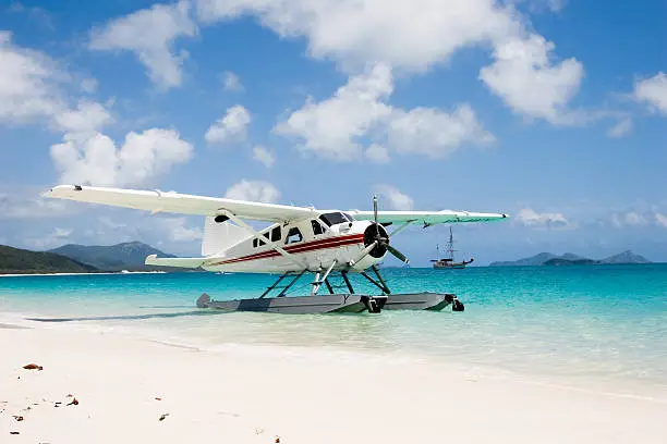 Seaplane on Whitehaven Beach in Queensland, Australia.