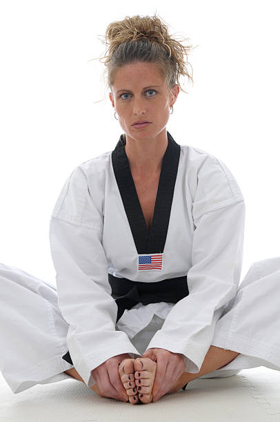 tae kwon делают учитель - martial arts women tae kwon do black belt стоковые фото и изображения