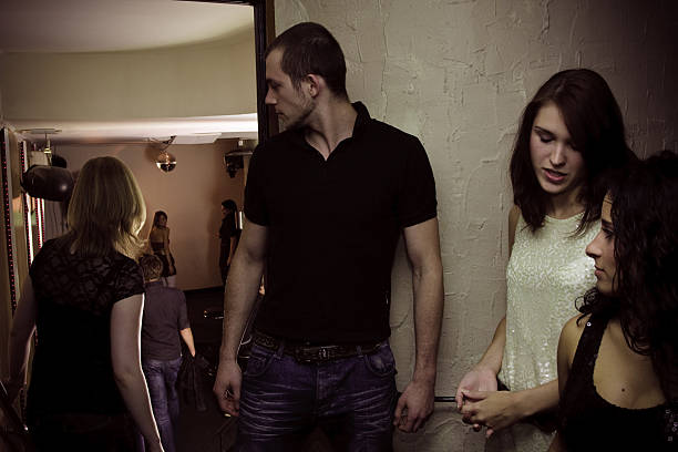 istock bouncer checking people at the nightclub 176133304