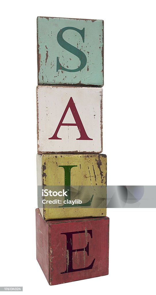 SALE with clipping path SALE on stacked and balanced antique blocks Antique Stock Photo