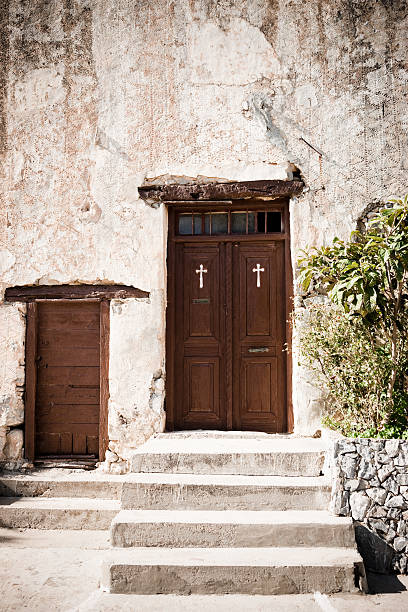 Architectural details of Deir el-Muhraqa (‘Monastery of the Great Fire’) the Muhraqa Carmalite Monastery on Mount Carmel, is the traditional site where Elijah faced off against the prophets of Baal. Cats in the doorway.