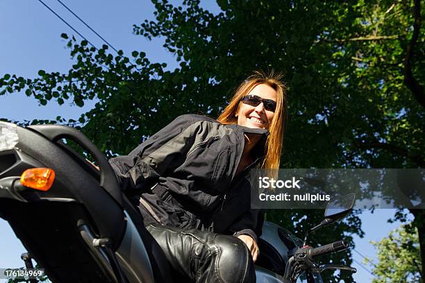 Adult Woman Riding Her Motorcycle Stock Photo - Download Image Now - 40-49 Years, Adult, Adults Only