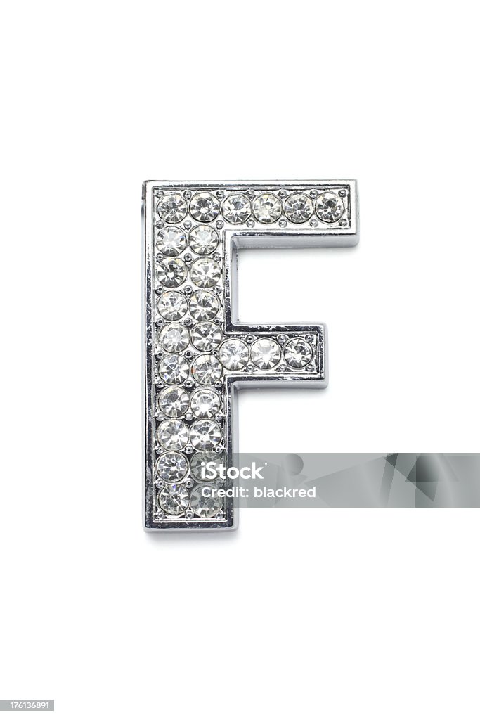 Diamond Alphabet F "Diamond letter F with platinum outline. Isolated on white background. Not 3D rendering, it's a shot from a real object, each diamond has different reflections." Diamond - Gemstone Stock Photo