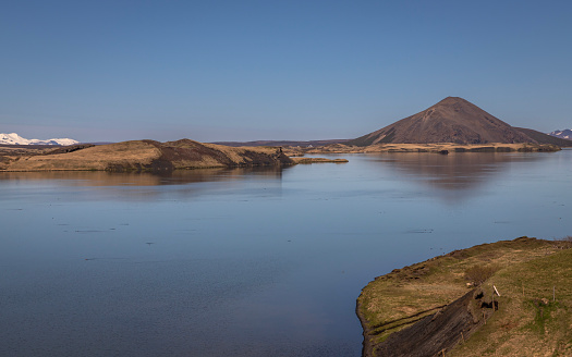 The Skutustadagigar Craters are found in the Lake Mývatn area, which is very volcanic, being near to the Krafla volcano system. The nature of the lake itself and the volcanism of the region both led to the creation of these unusual formations.
