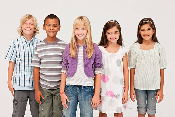 istock Group of happy kids smiling against white 176137409