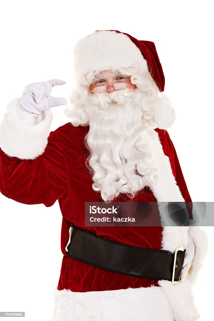 Santa wskazujące coś na białym tle - Zbiór zdjęć royalty-free (Białe tło)