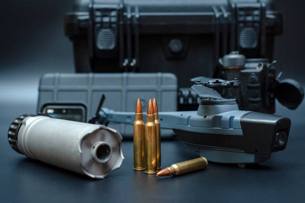 istock Sniper set. Silencer, bullet cartridges, quadcopter, smartphone, night vision device and black hard case 1761417221
